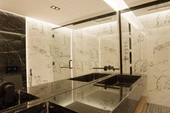A modern apartment interior with a stylish bathroom