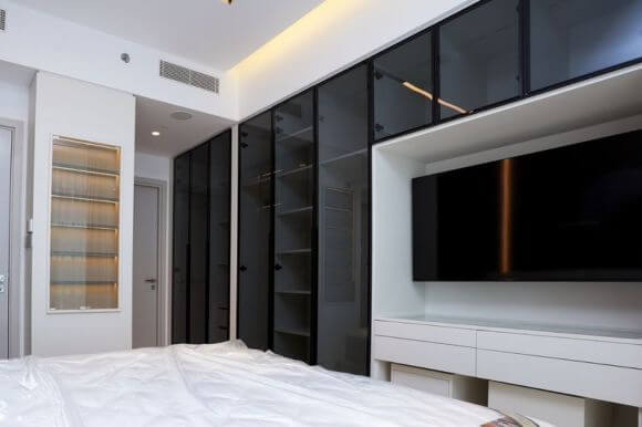 A modern apartment interior with a stylish dressing room