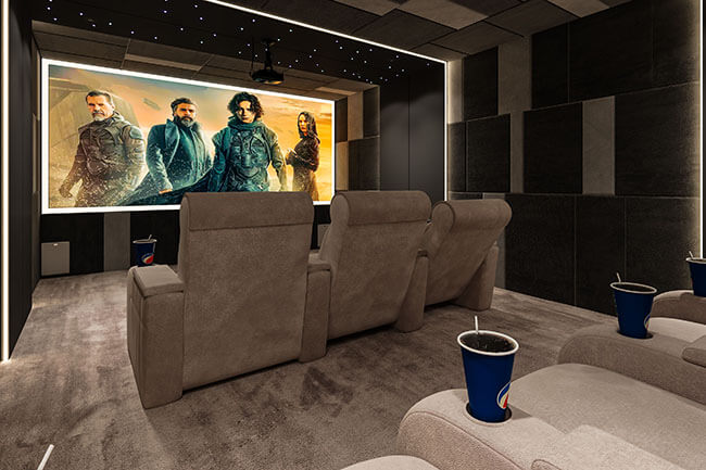 a home theater with seats and a projector screen