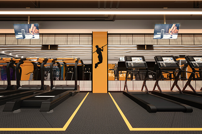 a gym with treadmills and televisions on the wall